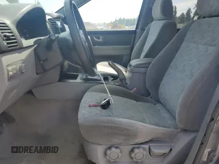 2005 Kia Sorento LX z VIN KNDJC733055488404, wystawiony jako Copart lot #60731165 z przebiegiem 189 749 mil mil oraz Szkoda całkowita • Salvage title. Historia ofert i sprzedaży dostępna na DreamBid. Obrazek 7.