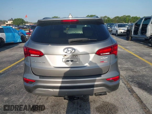 2017 Hyundai Santa Fe 2.4L z VIN 5XYZU3LB0HG420910, wystawiony jako IAAI lot #42017552 z przebiegiem 184 666 mil mil oraz . Historia ofert i sprzedaży dostępna na DreamBid. Obrazek 16.