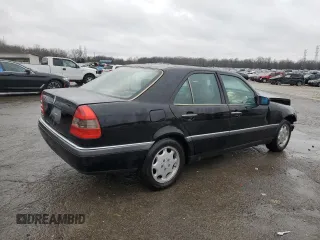 1996 Mercedes-Benz C with VIN WDBHA28E7TF328169, listed as a Copart auction lot 83653124 with 282,232 mi miles and Salvage Title. Bid and sale history available at carsss.com. Image 3.