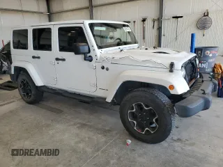 2015 Jeep Wrangler Unlimited Sahara with VIN 1C4BJWEG2FL620001, listed as a Copart auction lot 63914725 with 114,810 mi miles and Salvage title. Bid and sale history available at DreamBid. Image 4.