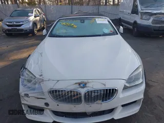 2012 BMW 6 Series 650i with VIN WBALZ3C51CDL73084, listed as a IAAI auction lot 41656473 with 61,152 mi miles and . Bid and sale history available at carsss.com. Image 12.