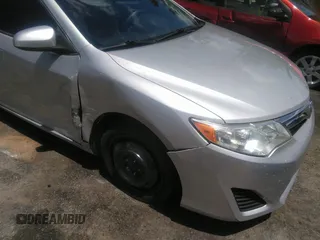 2013 Toyota Camry L with VIN 4T1BF1FK4DU235212, listed as a IAAI auction lot 42739944 with 123,408 mi miles and . Bid and sale history available at DreamBid. Image 1.