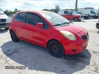 2007 Toyota Yaris with VIN JTDJT923375055871, listed as a IAAI auction lot 42038371 with 115,209 mi miles. Bid and sale history available at carsss.com. Image 1.