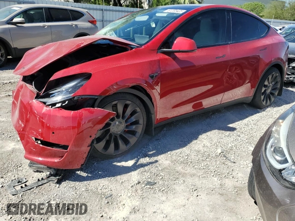 2022 Tesla Model Y Performance z VIN 7SAYGDEF9NF510183, wystawiony jako Copart lot #61263405 z przebiegiem 19 411 mil mil oraz Szkoda całkowita • Salvage title. Historia ofert i sprzedaży dostępna na DreamBid. Obrazek 1.