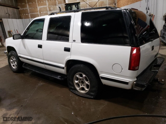 1999 Chevrolet Tahoe Z71 with VIN 1GNEK13R4XJ356365, listed as a Copart auction lot 49849285 with 187,701 mi miles and Salvage Title. Bid and sale history available at carsss.com. Image 2.