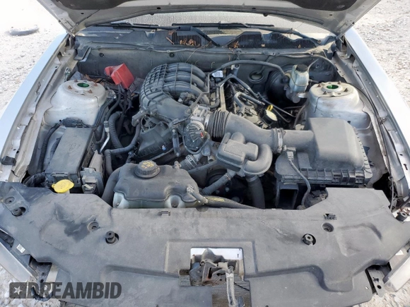 2012 Ford Mustang Premium z VIN 1ZVBP8AM7C5285563, wystawiony jako Copart lot #60732815 z przebiegiem 134 923 mil mil oraz Szkoda całkowita • Salvage title. Historia ofert i sprzedaży dostępna na DreamBid. Obrazek 11.
