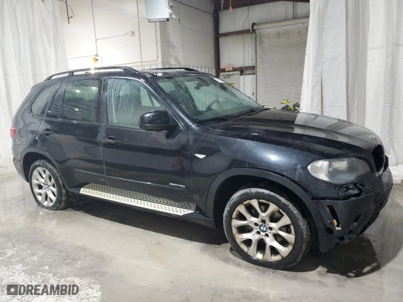 2011 BMW X5 35i with VIN 5UXZV4C58BL413906, listed as a Copart auction lot 48523905 with 161,227 mi miles and Salvage Title. Bid and sale history available at carsss.com. Image 4.