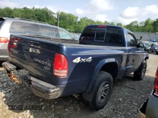 2004 Dodge Dakota z VIN 1D7GG16KX4S586053, wystawiony jako Copart lot #60221585 z przebiegiem 150 150 mil mil oraz Szkoda całkowita • Salvage title. Historia ofert i sprzedaży dostępna na DreamBid. Obrazek 3.