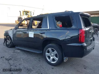 2019 Chevrolet Tahoe LT with VIN 1GNSKBKC3KR284087, listed as a IAAI auction lot 41345856 with 70,394 mi miles. Bid and sale history available at carsss.com. Image 3.