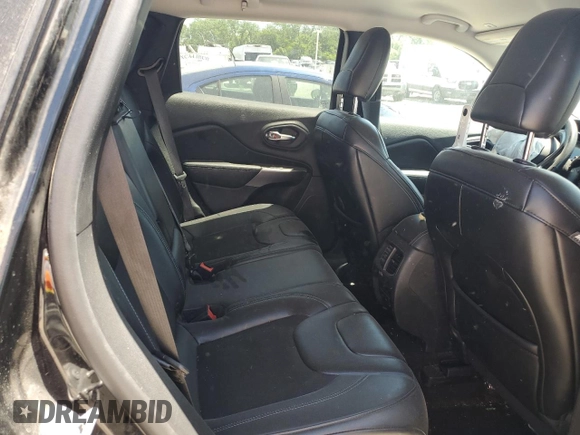 2019 Jeep Cherokee Latitude Plus z VIN 1C4PJMLBXKD409716, wystawiony jako Copart lot #56367955 z przebiegiem 53 831 mil mil oraz Szkoda całkowita • Salvage title. Historia ofert i sprzedaży dostępna na DreamBid. Obrazek 10.