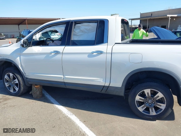 2017 Honda Ridgeline RTL-E with VIN 5FPYK3F7XHB011188, listed as a IAAI auction lot 41766257 with 90,020 mi miles. Bid and sale history available at carsss.com. Image 15.