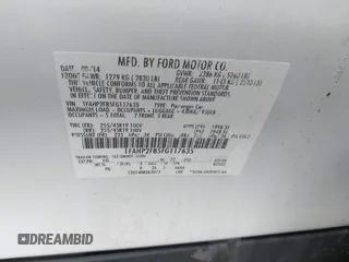 2015 Ford Taurus Limited with VIN 1FAHP2F85FG117635, listed as a IAAI auction lot 41979311 with 104,314 mi miles. Bid and sale history available at carsss.com. Image 9.