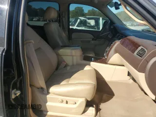 2011 GMC Yukon Denali with VIN 1GKS1EEFXBR121055, listed as a Copart auction lot 77194354 with 98,806 mi miles and Salvage Title. Bid and sale history available at carsss.com. Image 7.
