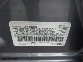 2007 Mitsubishi Outlander ES with VIN JA4MS31X07Z015784, listed as a IAAI auction lot 38911508 with 166,115 mi miles. Bid and sale history available at carsss.com. Image 9.