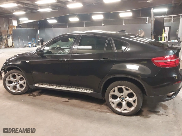 2014 BMW X6 xDrive35i with VIN 5UXFG2C51E0K41841, listed as a IAAI auction lot 41851513 with 79,272 mi miles. Bid and sale history available at carsss.com. Image 14.