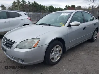 2003 Nissan Altima S with VIN 1N4AL11D33C265538, listed as a IAAI auction lot 42082079 with 180,138 mi miles. Bid and sale history available at carsss.com. Image 2.
