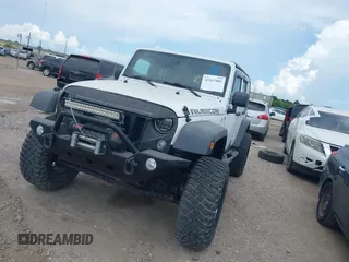 2011 Jeep Wrangler Unlimited Rubicon with VIN 1J4BA6H10BL536027, listed as a IAAI auction lot 42567901 with 164,487 mi miles and . Bid and sale history available at DreamBid. Image 17.