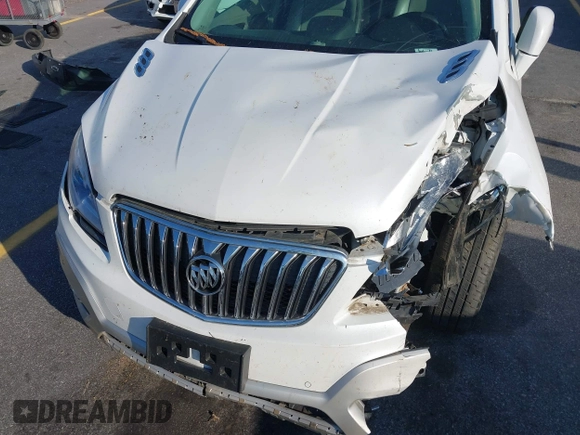 2016 Buick Encore Premium with VIN KL4CJDSB1GB647306, listed as a IAAI auction lot 41983159 with 59,592 mi miles. Bid and sale history available at carsss.com. Image 6.