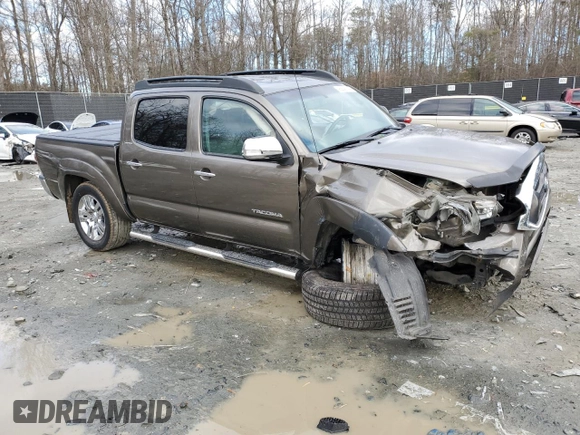 2015 Toyota Tacoma with VIN 3TMLU4EN4FM195426, listed as a Copart auction lot 86599744 with 136,461 mi miles and Salvage Title. Bid and sale history available at carsss.com. Image 4.