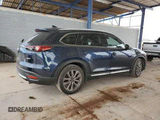 2021 Mazda CX-9 Carbon Edition z VIN JM3TCADY3M0513086, wystawiony jako Copart lot #53734925 z przebiegiem 92 744 mil mil oraz Szkoda całkowita • Salvage title. Historia ofert i sprzedaży dostępna na DreamBid. Obrazek 3.