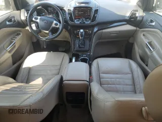 2015 Ford Escape Titanium with VIN 1FMCU9J92FUC74879, listed as a Copart auction lot 54683185 with 143,436 mi miles and Salvage title. Bid and sale history available at DreamBid. Image 8.