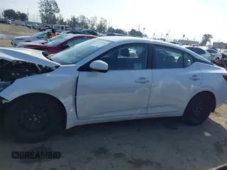 2020 Nissan Sentra SV z VIN 3N1AB8CV3LY303100, wystawiony jako IAAI lot #41588362 z przebiegiem 77 097 mil mil oraz . Historia ofert i sprzedaży dostępna na DreamBid. Obrazek 14.