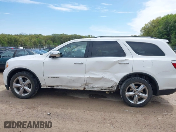 2013 Dodge Durango Citadel z VIN 1C4SDJET7DC512400, wystawiony jako IAAI lot #42246815 z przebiegiem 186 427 mil mil oraz . Historia ofert i sprzedaży dostępna na DreamBid. Obrazek 14.