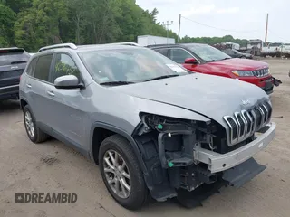 2014 Jeep Cherokee Latitude z VIN 1C4PJMCB2EW268455, wystawiony jako IAAI lot #42396756 z przebiegiem 203 289 mil mil oraz . Historia ofert i sprzedaży dostępna na DreamBid. Obrazek 1.