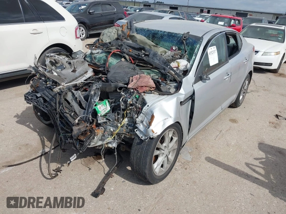 2013 Kia Optima LX z VIN 5XXGM4A73DG094160, wystawiony jako IAAI lot #41523337 z przebiegiem Nie podano mil oraz . Historia ofert i sprzedaży dostępna na DreamBid. Obrazek 16.