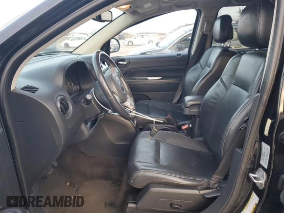 2015 Jeep Compass High Altitude Edition with VIN 1C4NJDEBXFD217481, listed as a Copart auction lot 41563165 with 180,626 mi miles and Salvage Title. Bid and sale history available at carsss.com. Image 7.