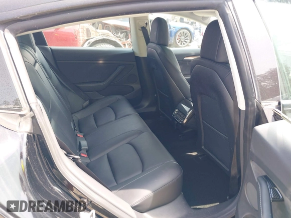 2022 Tesla Model 3 Long Range with VIN 5YJ3E1EB7NF241996, listed as a IAAI auction lot 42115915 with 23,433 mi miles and . Bid and sale history available at DreamBid. Image 8.