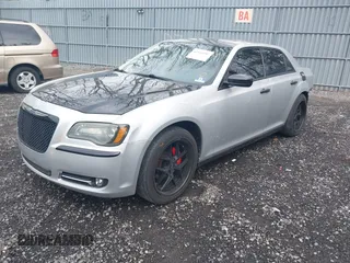 2012 Chrysler 300 Limited with VIN 2C3CCACG4CH246136, listed as a IAAI auction lot 41944107 with 137,270 mi miles. Bid and sale history available at carsss.com. Image 2.