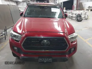 2018 Toyota Tacoma SR with VIN 3TMCZ5AN0JM166978, listed as a IAAI auction lot 41936143 with 129,674 mi miles. Bid and sale history available at carsss.com. Image 12.