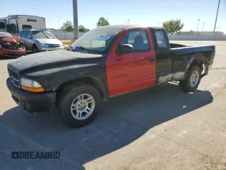 2003 Dodge Dakota SLT with VIN 1D7HL42X33S284170, listed as a Copart auction lot 76657204 with 146,790 mi miles and Salvage Title. Bid and sale history available at carsss.com. Image 1.