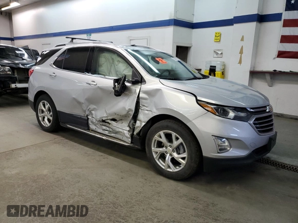 2020 Chevrolet Equinox Premier z VIN 2GNAXXEV3L6128099, wystawiony jako Copart lot #79041114 z przebiegiem 65 856 mil mil oraz Szkoda całkowita • Salvage title. Historia ofert i sprzedaży dostępna na DreamBid. Obrazek 4.