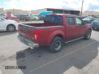 2015 Nissan Frontier SV with VIN 1N6AD0ER3FN725360, listed as a IAAI auction lot 41206610 with 100,641 mi miles and . Bid and sale history available at DreamBid. Image 4.