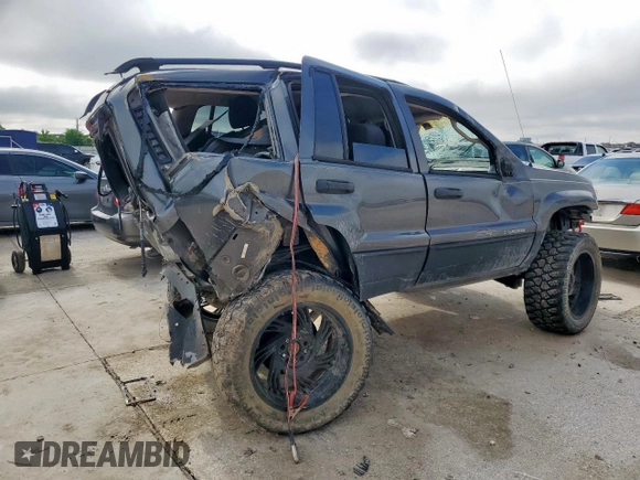 2003 Jeep Grand Cherokee Laredo with VIN 1J4GX48S63C604527, listed as a Copart auction lot 55996725 with Not provided miles and Non repairable. Bid and sale history available at DreamBid. Image 3.