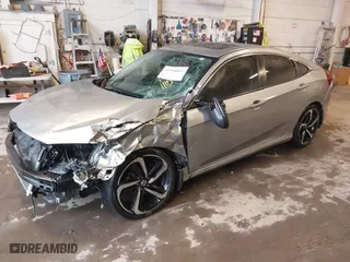 2016 Honda Civic Sedan EX with VIN 19XFC2F70GE005122, listed as a IAAI auction lot 41958869 with 110,903 mi miles. Bid and sale history available at carsss.com. Image 2.