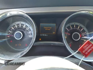 2013 Ford Mustang V6 with VIN 1ZVBP8AM1D5246288, listed as a IAAI auction lot 42024934 with 141,791 mi miles. Bid and sale history available at carsss.com. Image 7.