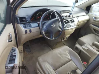 2009 Honda Odyssey EX-L with VIN 5FNRL38649B413532, listed as a Copart auction lot 79867014 with 308,701 mi miles and Salvage Title. Bid and sale history available at DreamBid. Image 8.