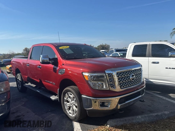 2016 Nissan Titan Platinum Reserve z VIN 1N6BA1F26GN512666, wystawiony jako Copart lot #43622745 z przebiegiem 120 182 mil mil oraz Czysty tytuł • Clean title. Historia ofert i sprzedaży dostępna na DreamBid. Obrazek 1.