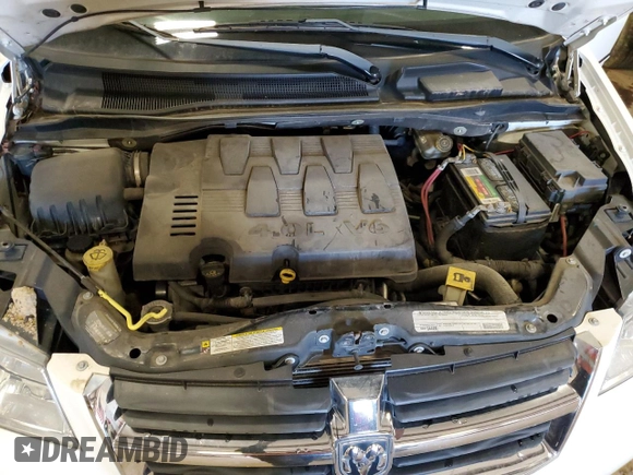2010 Dodge Grand Caravan Crew with VIN 2D4RN6DX5AR499360, listed as a Copart auction lot 49604025 with 100,222 mi miles and Non Repairable. Bid and sale history available at DreamBid. Image 12.