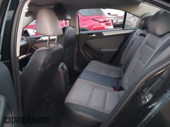 2013 Volkswagen Jetta Hybrid SEL with VIN 3VW637AJ1DM277984, listed as a IAAI auction lot 41450384 with 117,665 mi miles and . Bid and sale history available at DreamBid. Image 8.