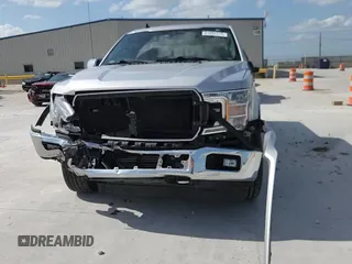 2019 Ford F-150 XL with VIN 1FTEW1E4XKKD25168, listed as a Copart auction lot 61694315 with 113,626 mi miles and Salvage title. Bid and sale history available at DreamBid. Image 13.