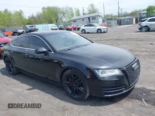 2014 Audi A7 Premium Plus z VIN WAUWGAFC1EN085810, wystawiony jako IAAI lot #42133978 z przebiegiem 181 180 mil mil oraz . Historia ofert i sprzedaży dostępna na DreamBid. Obrazek 1.
