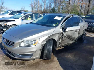 2016 Volvo S60 T5 Premier z VIN LYV612TK2GB099241, wystawiony jako IAAI lot #41808950 z przebiegiem 153 693 mil mil oraz . Historia ofert i sprzedaży dostępna na DreamBid. Obrazek 2.