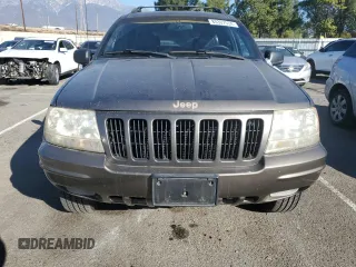 1999 Jeep Grand Cherokee Limited with VIN 1J4G268SXXC759016, listed as a Copart auction lot 80307534 with 215,870 mi miles and Salvage title. Bid and sale history available at DreamBid. Image 5.