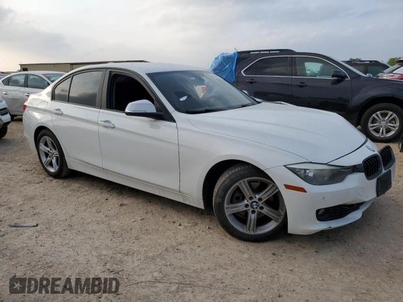 2014 BMW 3 Series 328i with VIN WBA3C1C52EK111563, listed as a Copart auction lot 51465165 with 142,125 mi miles and Salvage title. Bid and sale history available at DreamBid. Image 4.