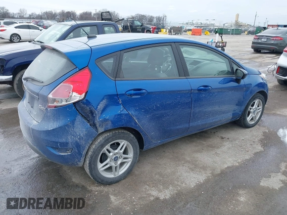 2019 Ford Fiesta SE with VIN 3FADP4EJ2KM121091, listed as a IAAI auction lot 41595764 with 98,669 mi miles. Bid and sale history available at carsss.com. Image 4.