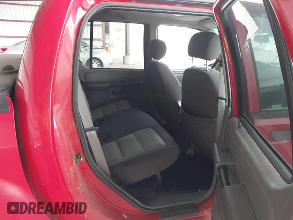 2005 Ford Explorer Sport Trac XLS z VIN 1FMZU67K75UA79569, wystawiony jako IAAI lot #41842068 z przebiegiem 212 991 mil mil oraz . Historia ofert i sprzedaży dostępna na DreamBid. Obrazek 8.
